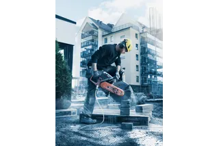 Husqvarna K770 power cutter in use cutting concrete blocks
