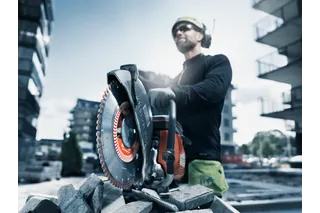 Husqvarna K770 power cutter in use on a construction site