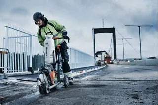 Husqvarna K770 power cutter in use on bridge construction