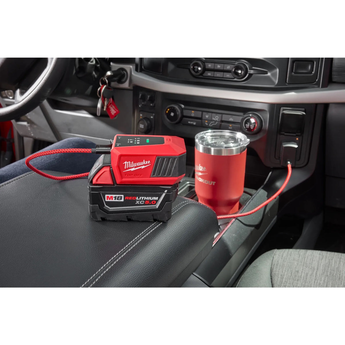 Milwaukee M18 TOP-OFF charger used inside a vehicle