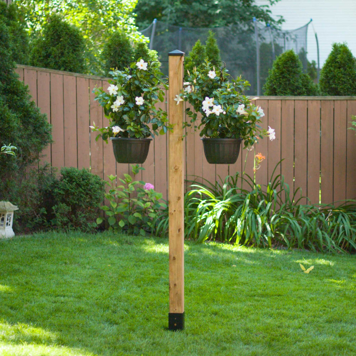 Nuvo Iron NYS30B yard spike installed with a wood post
