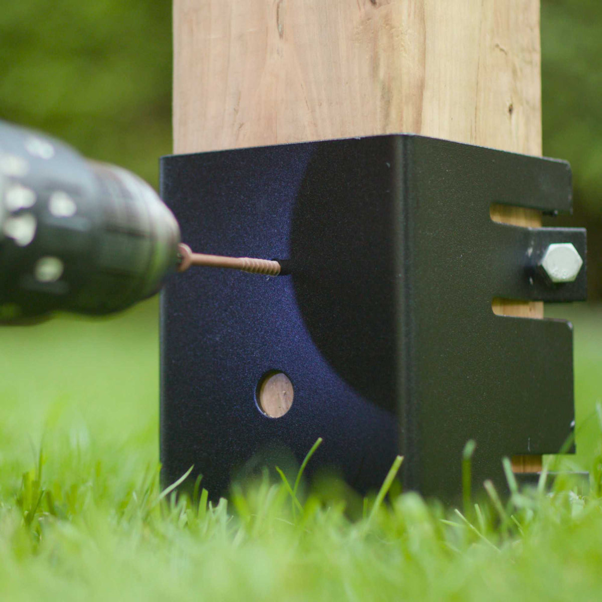 Fastening a nominal 4-inch by 4-inch post to the Nuvo Iron yard spike
